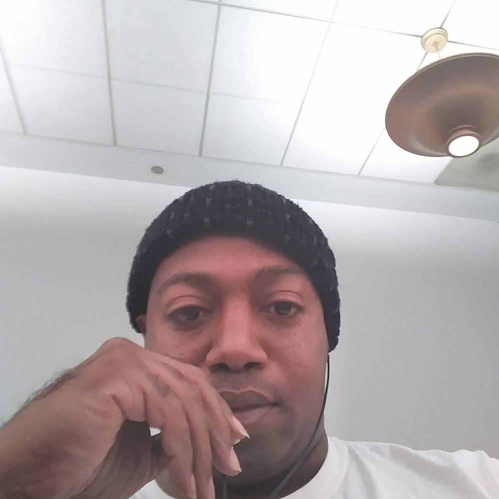 18K gold plated chain with money sign medallion